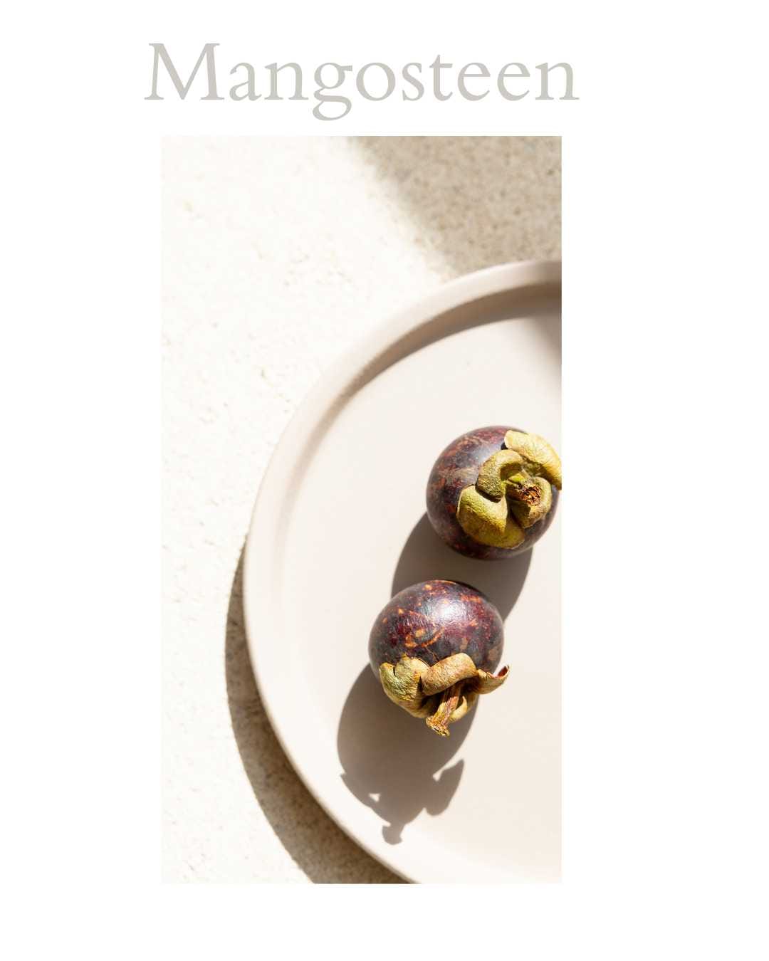 Fresh mangosteen fruit revealing its white segments, symbolizing contemplation, nourishment and the signs of Allah in creation.